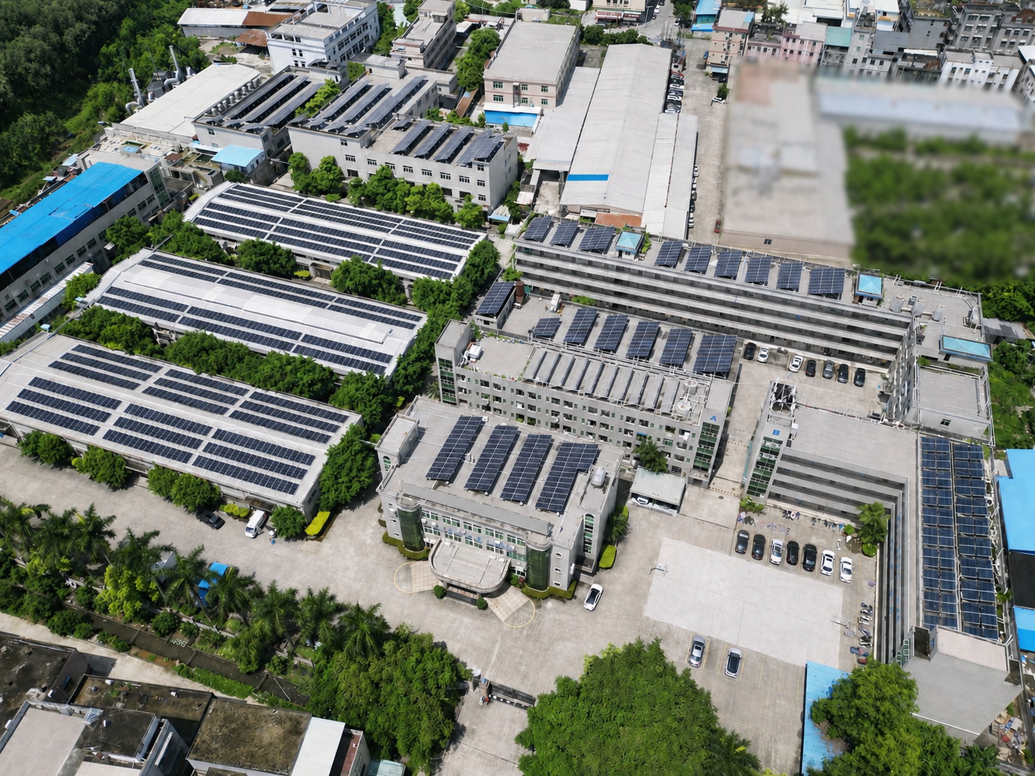 Aerial view of the GOLDENLUCK manufacturing campus and rooftop solar panels